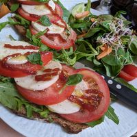 Tomato and vegan mozzarella on bread at V-Cake Cafe in Dresden