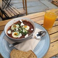 Vegan shakshouka and maracuja juice at V-Cake Cafe in Dresden