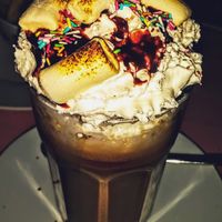 Vegan chai latte with wipped cream and marshmallows at Chaostheorie in Berlin