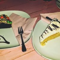 Vegan cakes: chocolate candy cake and white chocolate with marshmallows at Chaostheorie in Berlin