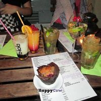 A selection of cocktails and a muffin. at Chaostheorie in Berlin