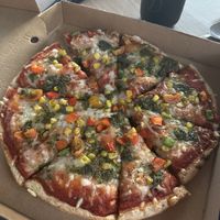 Vg cheese pizza with vg pesto & veg  at Woolacombe Bay Pizza in Woolacombe