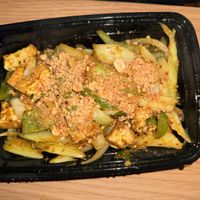 Tofu, jalapeños, bell peppers, basil leaves, celery & onion stir-fried in a Cambodian style curry-lemongrass paste (Kroeung)  at Daleng Restaurant in Philadelphia