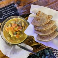Delicious yellow curry with roti bread   at Lanna Square Vegan in Chiang Mai