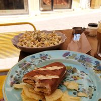 Vegan toasted sandwich and side of chips at Tiny Rebels in Crete