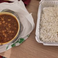 Chana masala and rice for takeout. Tastes way better than the containers make it look ;) at Tandoor in Mallorca
