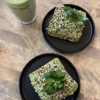 Avocado toast and oat milk matcha latte  at Cafe Hagen in Seattle
