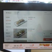 Ordering from a tablet at Loving Hut - Real Love in Seoul
