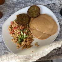 Vegan breakfast platter w/ tofu scramble, pumpkin pancake + Dr. Praegers patties   at Kerbey Lane Cafe - Central in Austin
