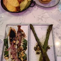 Asparagus, paksoi, nachos and pastel de nata at Rozey in The Hague