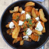 Patatas bravas with vegan alioli  at Ses Feixes  in Alicante