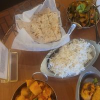 Roti, basmati rice, aloo gobi, and bhindi at Clay Pit in Austin