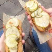 Roasted hot dog with vegan toppings at Den Okologiske Polsemand - Food Stall in Copenhagen
