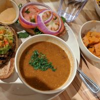 Chicken sandwich with lentil soup side at Veggie Grill by Next Level in La Jolla