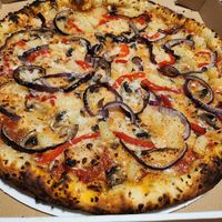 Vegan Incantation B with onion, mushroom, pineapple, and roasted red peppers. at Papa Zuzu's Pizza in Kelso