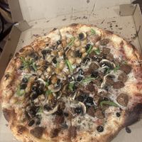 Half chicken half meatball vegan pizza!!!  at Vegan Pizza  in Denver