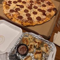 Pizza and garlic knots   at Vegan Pizza  in Denver