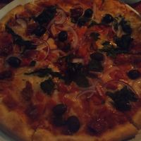 Vegan veggie supreme pizza with olives at Freddy's in Galway