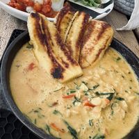 Hindu bowl with coconut curry and plantains  at Dosis Cafe - Valle in Valle De Bravo