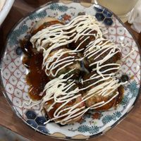 Takoyaki! The mayo comes on the side for you to add  at Pivot BASE Cafe & Bar ＠Dotonbori in Osaka