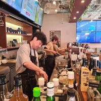 The enigmatic manager. at Pivot BASE Cafe & Bar ＠Dotonbori in Osaka