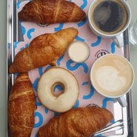 Laugen- and Buttergipfel, Vanilla Donut, Coffee at Bakery Bakery  - Schaffhauserplatz in Zurich