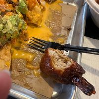 Mango habanero wings and nachos at Kind Burgers in San Antonio