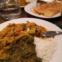 Masala dosas (background) tofu palak, mushroom rice at Sanskruti Restaurant in Manchester