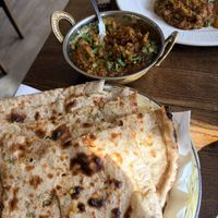 Aubergine dish and stuffed paratha  at Sanskruti Restaurant in Manchester