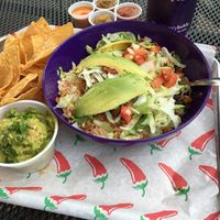 Vegetarian Crumble with a side of guacamole and chips. at El Camino Gourmet Tacos in Eagan