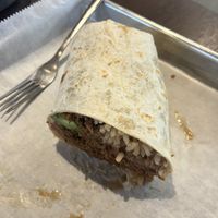 1/2 of the vegetarian crumbles burrito. Excellent. Held up well    at El Camino Gourmet Tacos in Eagan