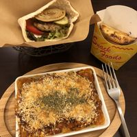 Hamburger pita, fries, and lasagna at Veggie Cafe in Kyoto