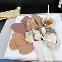 Meat and cheese platter! Beat vegan meat and cheese we’ve ever had!  at Fermaggio Bistrot & Store in Rome