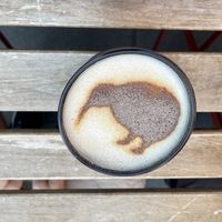 Chai with a kiwi shaped decoration on the foamm  at Kiwi Corner  in Mainz