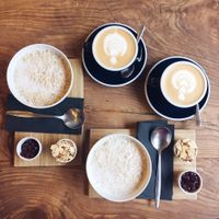 coffee and porridge with non-dairy milk  at Relaks in Warsaw