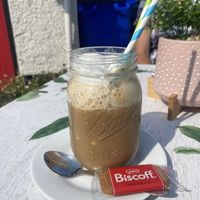 Iced chai latte with vegan whipped cream!   at Maple Maple Strawberry in Fareham