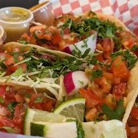 7 tacos with salsas at Taqueria Los Tres Figgies 2 in Ocean Shores