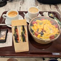 Vegan salad, sandwich, oat milk lattes at Cafeteria Cuevas del Drach in Mallorca
