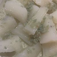 Yucca with fried garlic sauce  at Habanita in Sevilla