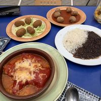 Croquettes, banana balls, black beans, stuffed peppers with vegan cheese  at Habanita in Sevilla