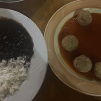 Albóndigas made from plantains in tomato sauce and beans with rice. 6.50€ each    at Habanita in Sevilla
