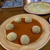 Bolinho de banana com molho de tomate  at Habanita in Sevilla