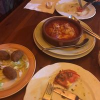 Vegan croquettes, stuffed peppers with vegan cheese and tomato and garlic salad at Habanita in Sevilla