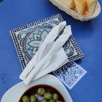 Olives, bread, and bread sticks. at Habanita in Sevilla