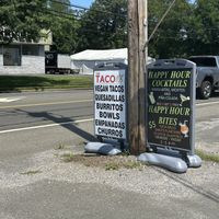 Sign outside  at The Taco 105 in Mattituck