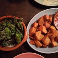 Pimiento peppers in sea salt and cube fries at Bodega Dali in Munich