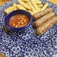 Vegan sausage,  beans and chips at The Mail Rooms in Ross-on-wye