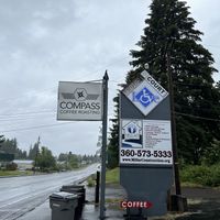 Look for this sign leading to the cafe  at Compass Coffee Roasting in Vancouver