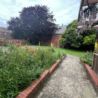 garden cared for by dementia community group in historic walled garden at Lenny's of Eastgate in Rochester