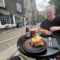 outside seating in the summer at The Cheese Room Botanicals in Rochester